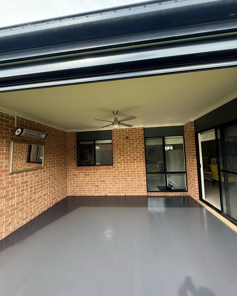 Charcoal resurfaced concrete driveway in Maffra